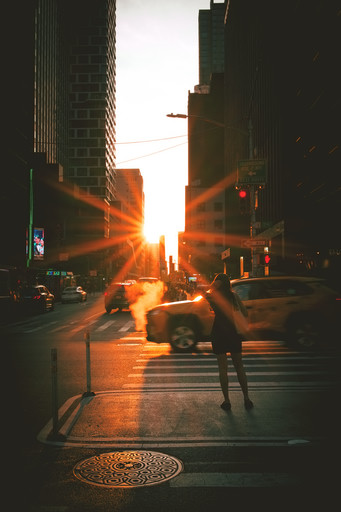 The same frame under a Super+ preset — shadows pulled down to black, the warmth kept to the heart of the light